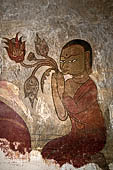 Bagan Myanmar. Sulamani temple. seated Buddha flanked by disciples. 